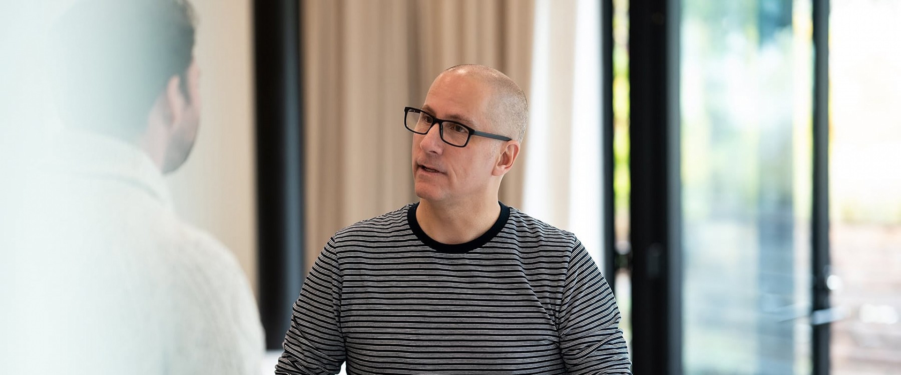 Michael Walsh, a professional Canadian interventionist based in Victoria, BC, speaks with a client who has concerns about a family member who is using drugs.
